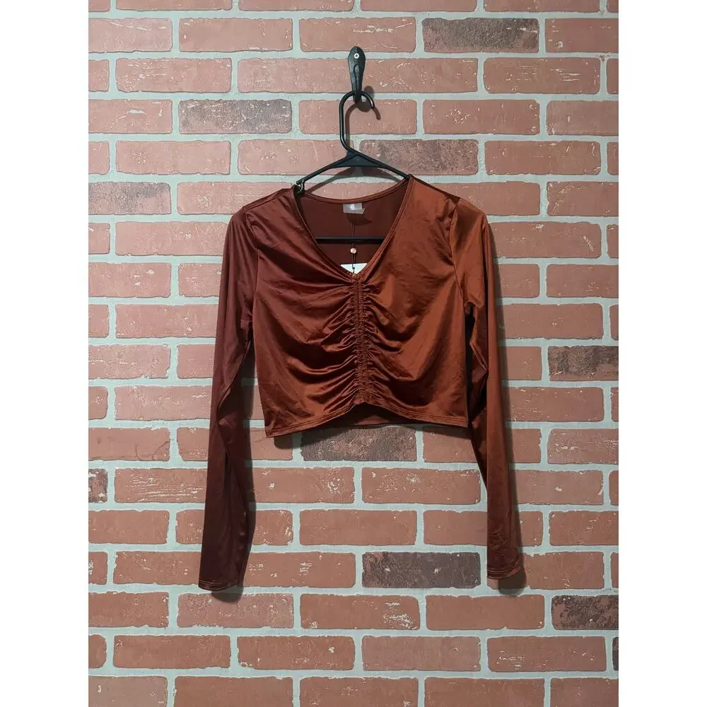 NWT/NWOT Calia long sleeve ruched swim rashguard in a red brown/copper color